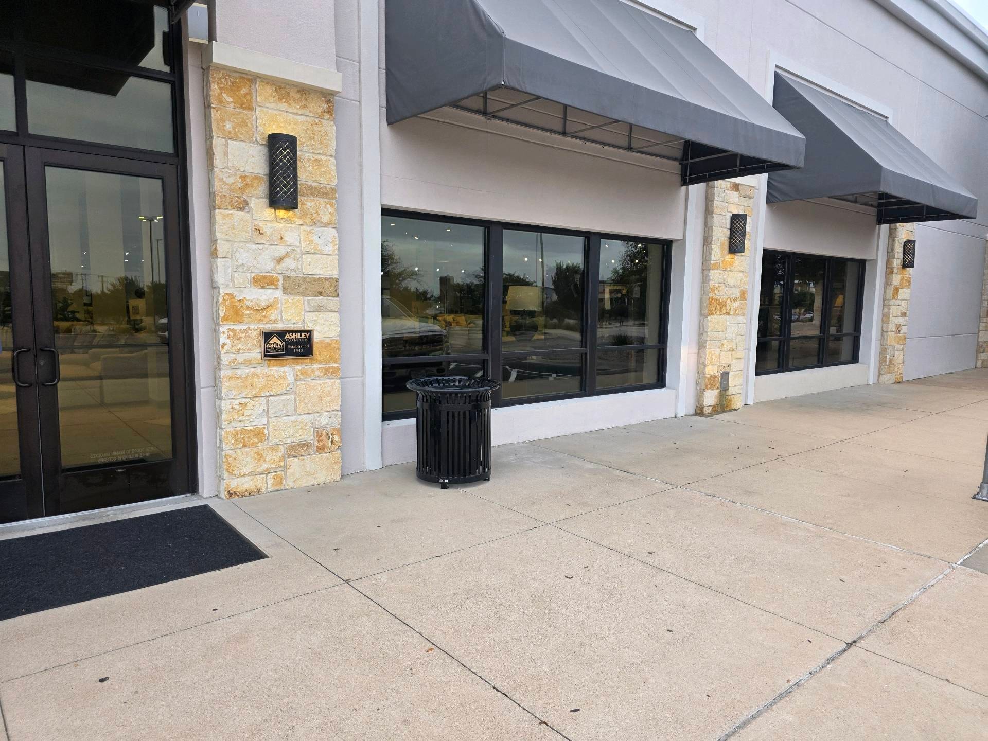 Commercial storefront exterior after cleaning — windows and entryway